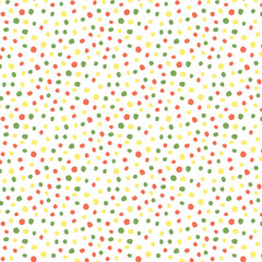Scattered red yellow green dots on white image