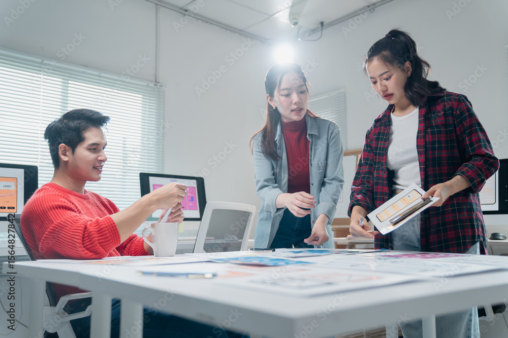Poster ui ux designers collaborating in a modern office, discussing user interface and user experience stra