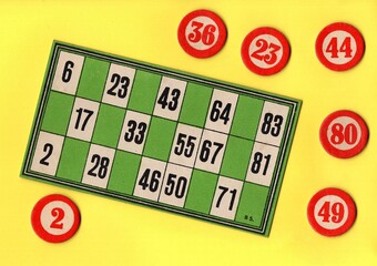 Content from the vintage game of Lotto or Bingo on a bright coloured background.