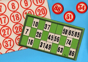 Content from the vintage game of Lotto or Bingo on a bright coloured background.