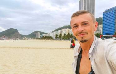Handsome Tourist on Copacabana Beach Rio de Janeiro Brazil.