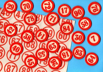 Content from the vintage game of Lotto or Bingo on a bright coloured background.