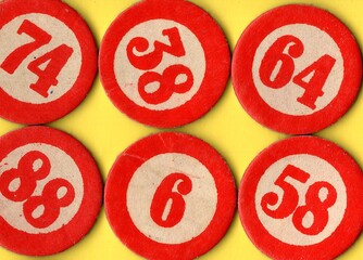 Content from the vintage game of Lotto or Bingo on a bright coloured background.