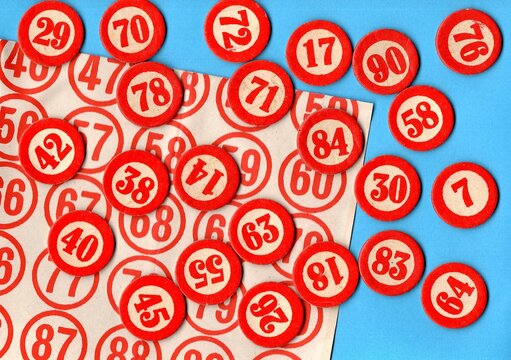 Content from the vintage game of Lotto or Bingo on a bright coloured background.