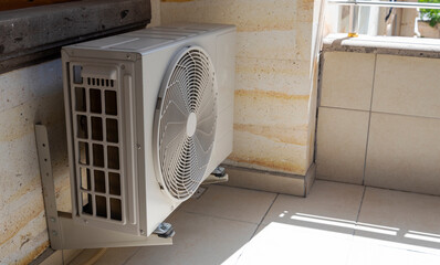 Air conditioning unit installed indoors in a bright and modern space during daytime