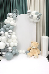 White background with pastel and transparent balloons.