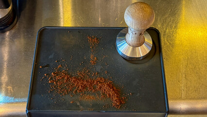 Espresso grounds whisper tales of morning ritual, barista's alchemy, International Coffee Day magic spills robust aroma