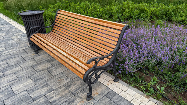 Wooden bench by lavender whispers tranquility, ideal for meditation moments or the quietude of National Simplicity Day
