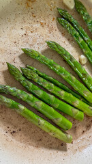 Grilled asparagus spears sizzle like verdant harbingers of spring, perfect for Umami Day and...