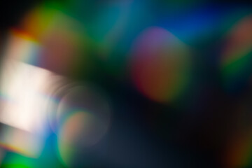 light leak overlay effect with blur rainbow light leaks,retro noisy film texture light leak flare on black background,abstract colorful background © ZMC-Studio
