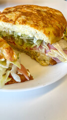 Toasted arepa brimming with rainbow vegetables and creamy cheese beckons for La Tomatina or Carnival's culinary symphony