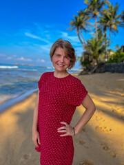Sunlit beach delight, Caucasian woman in crimson dress, celebrating International Day of Happiness, under swaying palm whispers