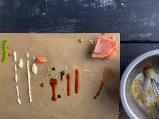Colorful condiment art on a rustic table evokes culinary alchemy, perfect for World Art Day or gastronomic soirees