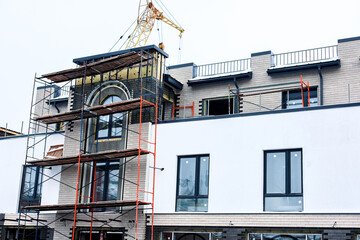 Construction of a new modern building in winter.
