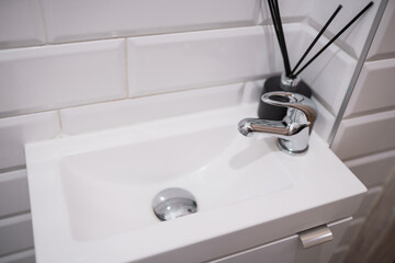 Small space bathroom with a sink.