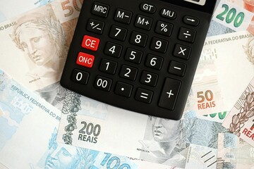 Brazilian reais banknotes and calculator. The current Brazil real money bills and calculator