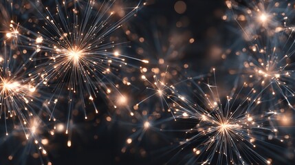 Fototapeta premium Ethereal sparklers dancing in the dark capturing moments of dazzling delight and festive celebration against a blurred