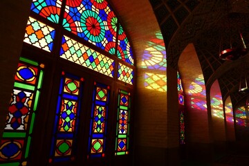 Colorful stained glass in mosque interior.