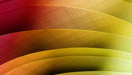 Curved overlapping paper sheets with a gradient from red to yellow in textured patterns. 3D rendering