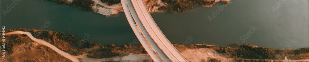 Poster aerial view of layered highway interchange and us border customs facility showcasing transportation 