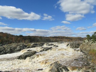 Rapid waters flowing over rocks 