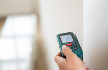 Laser Distance Meter Tool Provides Room Measurements