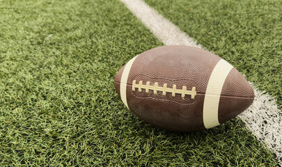 American football on football field background