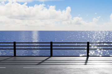 キラキラ光るガードレールのある海沿いの道
