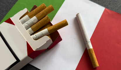  cigarette is on the flag of Italy, as a symbol of the harm of smoking.