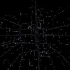 Aerial view of a city map showing buildings roads and intersections in a dark theme with a central focus