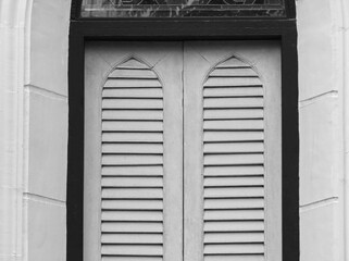 Colonial-style wooden window