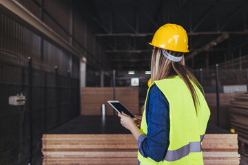 Engineer Supervising Construction Site with Safety Gear and Technology