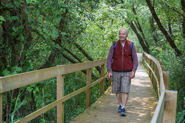 Elderly European Man Walking on an Eco-Trail in Portugal