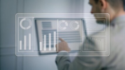 A business professional interacts with a transparent digital dashboard displaying various data charts and analytics.