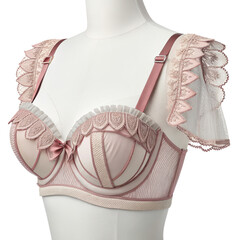 Elegant pink lingerie with delicate lace and soft frills showcased on a mannequin presenting a luxurious and refined design for fashion enthusiasts.