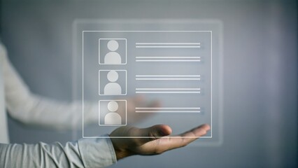 A hand holds a digital interface with user profile icons and lines, symbolizing virtual contacts or a digital network.