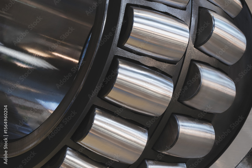 Poster ball bearing with a black outer shell and silver inner shell. inner shell is made of metal
