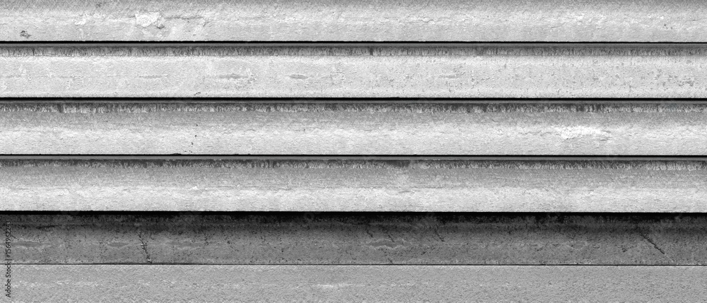 Poster stack of metal sheets with rust. plates are stacked on top of each other and have traces of laser pl