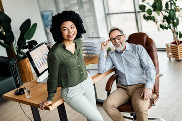 Professional team of diverse business people collaborating and working together in a modern office...