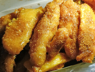 Close up of fried banana with brown sugar topping