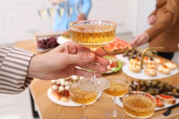 People with different appetizers at buffet, selective focus