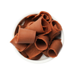 Tasty chocolate butter shavings in bowl isolated on white, top view