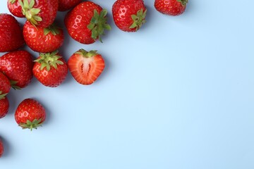 Fresh ripe strawberries on light background, flat lay. Space for text