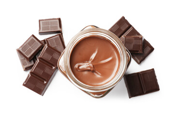 Tasty chocolate butter in jar and pieces isolated on white, top view