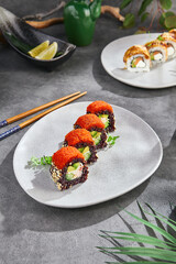 California maki with black rice and tobiko, bright daylight, overhead composition for modern menus