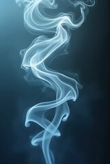 Obraz premium Wispy blue smoke swirls against dark background white abstract