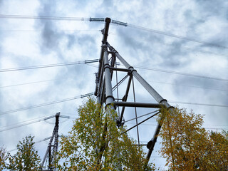 Krasnoyarsk Hydroelectric Power Station showcases towering pylons and cloudy skies during the afternoon