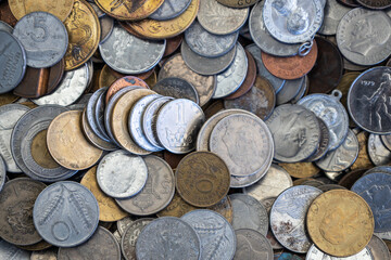 Collection of old coins from different countries. Old money in the form of coins.