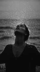 Radiant Embrace: Woman in Rain, Head Tilted Upwards, Black and White, Symbolizing Freedom, Rebirth, and Connection to Nature's Power