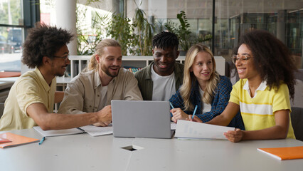 Group of multiracial diversity students e-learning together studying in high school pupils...